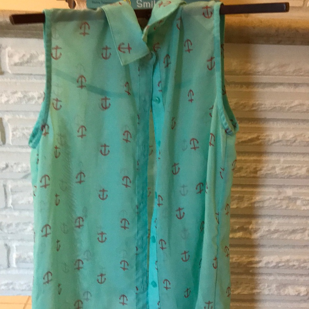 Teal shirt with gold anchors